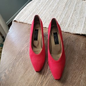Stuart Weitzman red shoes with Detailed Gold heels.